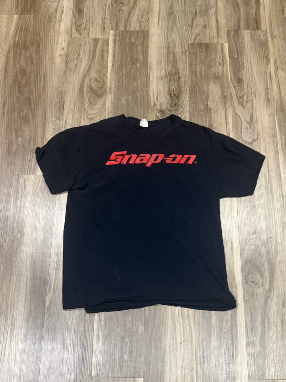 Vintage Fruit of the Loom Black T-Shirt with Red Snap-On Logo